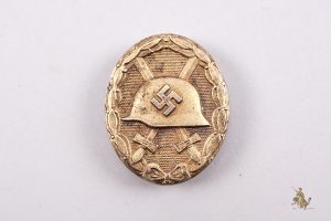 Gold Wound Badge marked 100