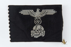 Waffen-SS Panzer Bevo M43 Unissued Cap Insignia